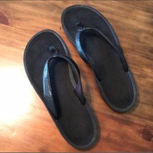 Olukai Black flip flops